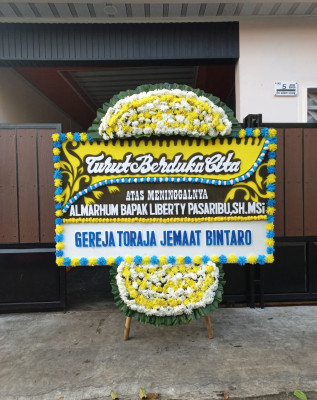 Papan Bunga Duka di Kampa